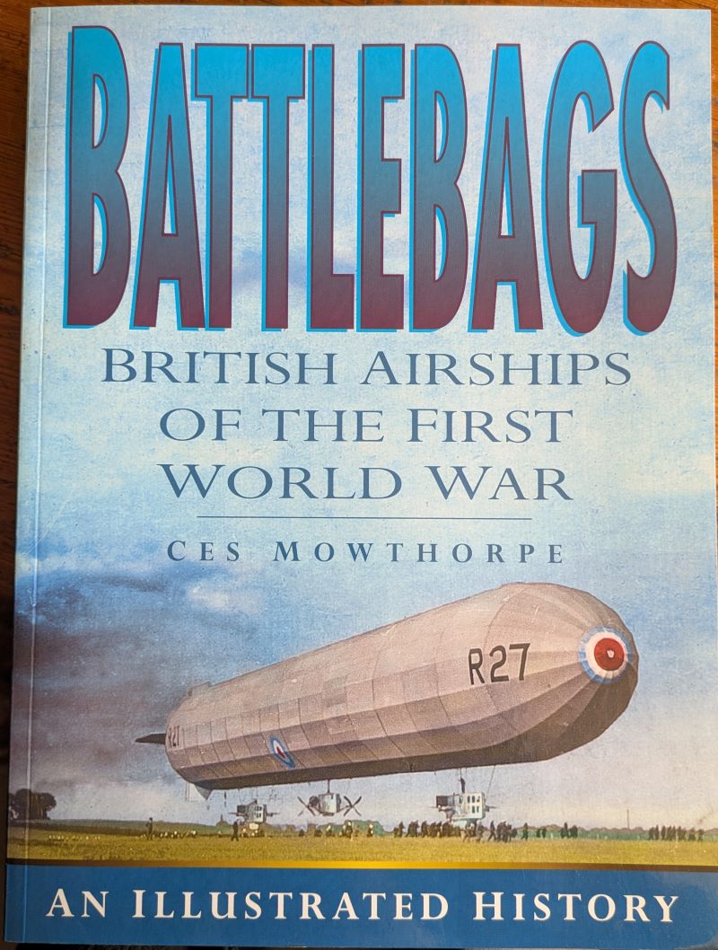 Picture of book cover showing Airship airborne near the ground with many ground crew in attendance